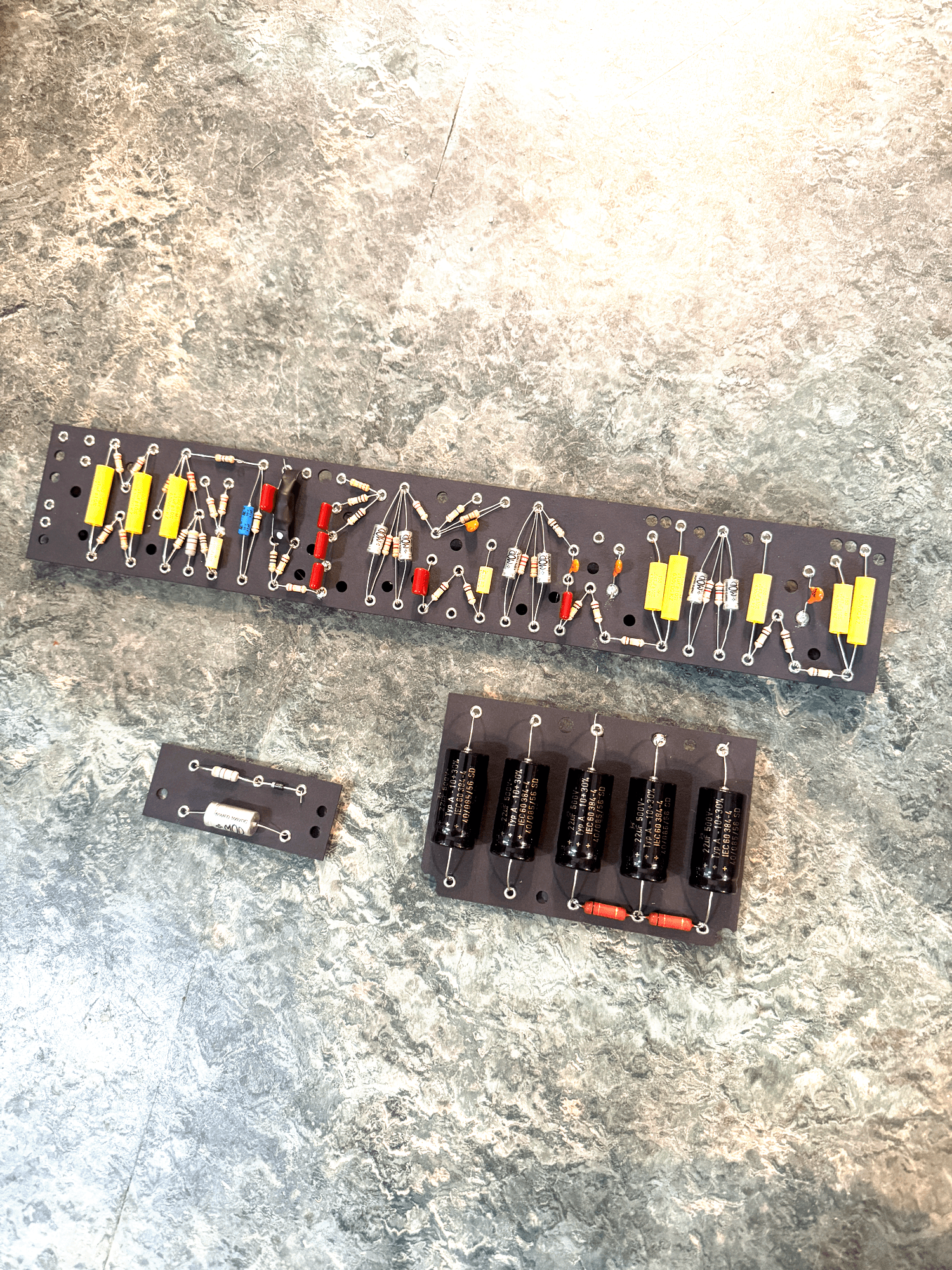 Custom hand-populated eyelet fiberboard for an AB763 circuit
